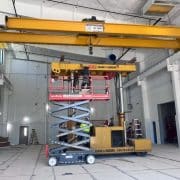 a 20-ton capacity overhead bridge crane being installed inside a industrial building